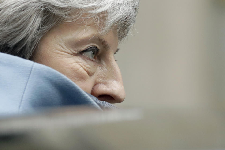 Britain's Prime Minister Theresa May leaves 10 Downing Street to attend the weekly Prime Ministers' Questions session, at parliament in London, Wednesday, March 20, 2019. (AP Photo/Matt Dunham)