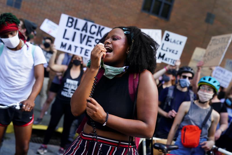 Protesters rally against racial inequality and the police shooting death of Rayshard Brooks, in Atlanta