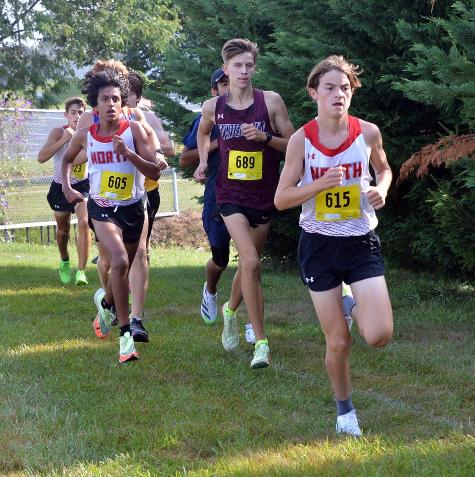 North Hagerstown's Walker Mason leads a pack of runners including Winters Mill's Jackson Steinbrenner and North's Rishi Bhat about a mile into the Rebel Invitational boys race. Steinbrenner won in 17:02.4, while Mason placed third in 17:12.6 as Washington County's top finisher and Bhat finished fifth in 17:31.7. The Hubs placed five runners in the top 10 to easily win the team title.