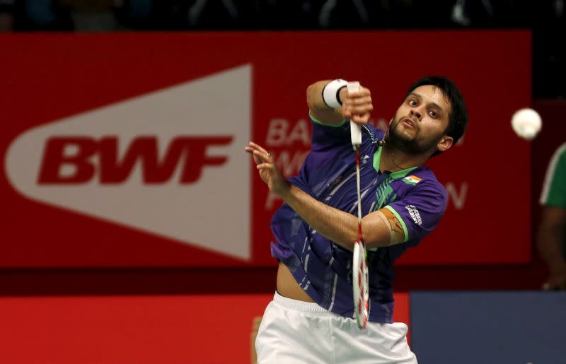 India's Kashyap Parupalli hits a return to Vietnam Nguyen Tien Minh during their men's single badminton match at the BWF World Championship in Jakarta