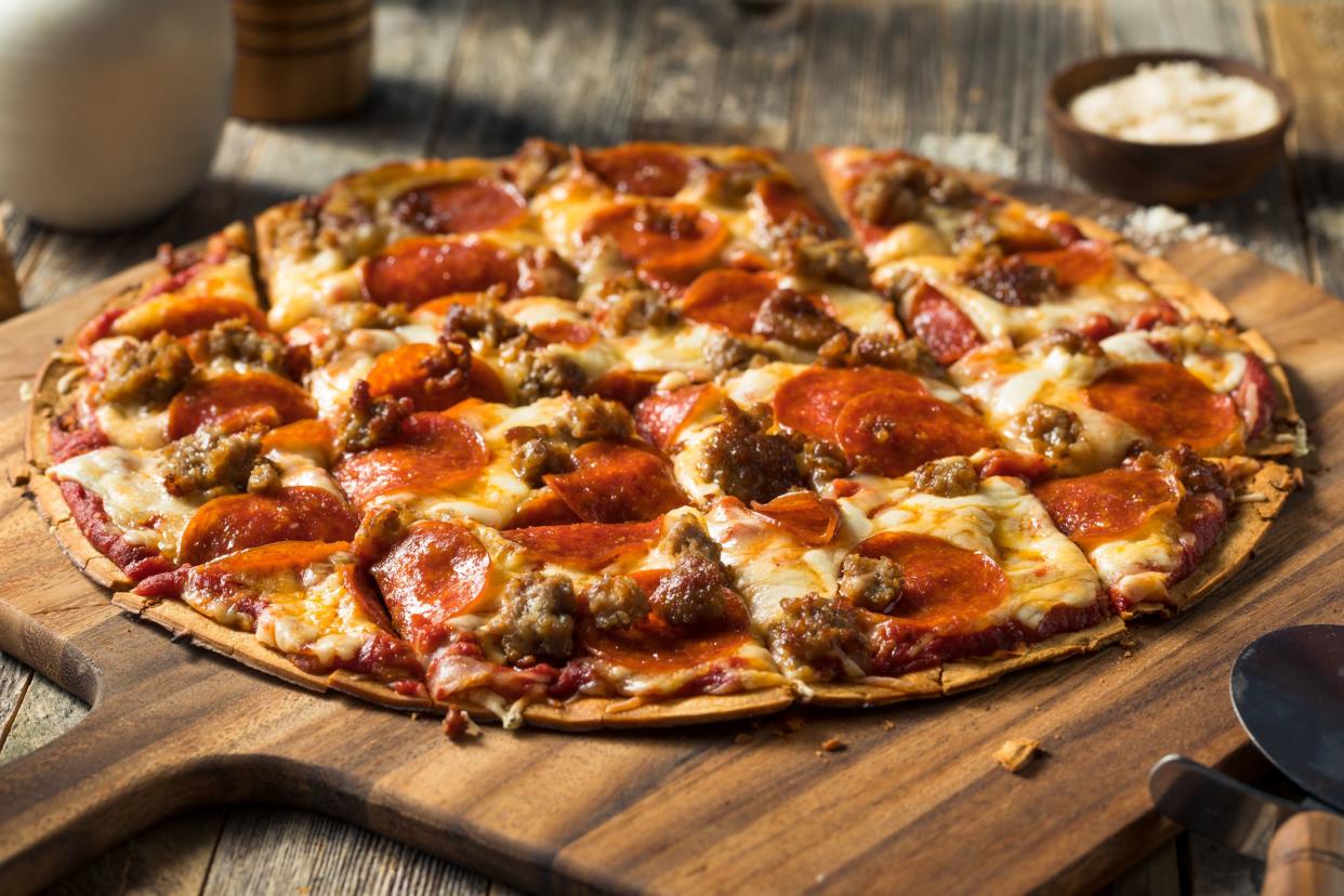 <p><br></p><p>Meet me in St. Louis for some insanely good pizza! <a href="https://www.goldbelly.com/foods/st-louis-style-pizza" rel="nofollow noopener" target="_blank" data-ylk="slk:St. Louis’ signature pizza;elm:context_link;itc:0;sec:content-canvas" class="link rapid-noclick-resp">St. Louis’ signature pizza</a> has a cracker-thin, yeast-free crust, and it’s topped with an oregano-heavy tomato sauce and Provel cheese (a white processed cheese that melts into gooey deliciousness) and cut into squares. Picture-perfect St. Louis-style pizza can be found at the city’s renowned <a href="https://www.goldbelly.com/restaurants/imos-pizza" rel="nofollow noopener" target="_blank" data-ylk="slk:Imo’s Pizza;elm:context_link;itc:0;sec:content-canvas" class="link rapid-noclick-resp">Imo’s Pizza</a>, which has been going strong for nearly 60 years. </p><span class="copyright"> bhofack2/Istockphoto </span>