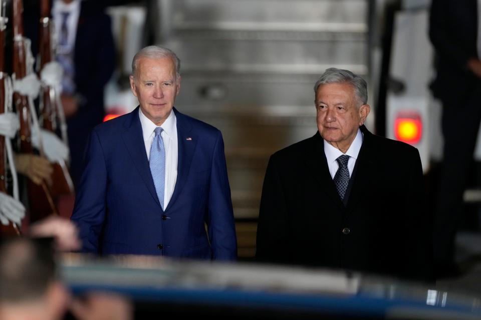 U.S. President Joe Biden walks with Mexican President Andrés Manuel López Obrador, at his arrival to the Felipe Angeles international airport in Zumpango, Mexico, Sunday, Jan. 8, 2023.