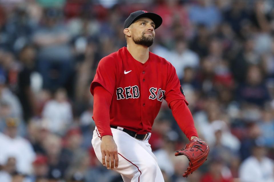 Boston Red Sox's Nathan Eovaldi reacts to an RBI double by New York Yankees' Anthony Rizzo during the first inning of a baseball game Friday, Aug. 12, 2022, in Boston. (AP Photo/Michael Dwyer)