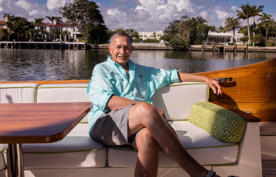Palm Beach resident George Cohon relaxes on his 48-foot Hinckley named McHappy III, in this file photo from February 2018. Cohon died Nov. 24 at age 86.