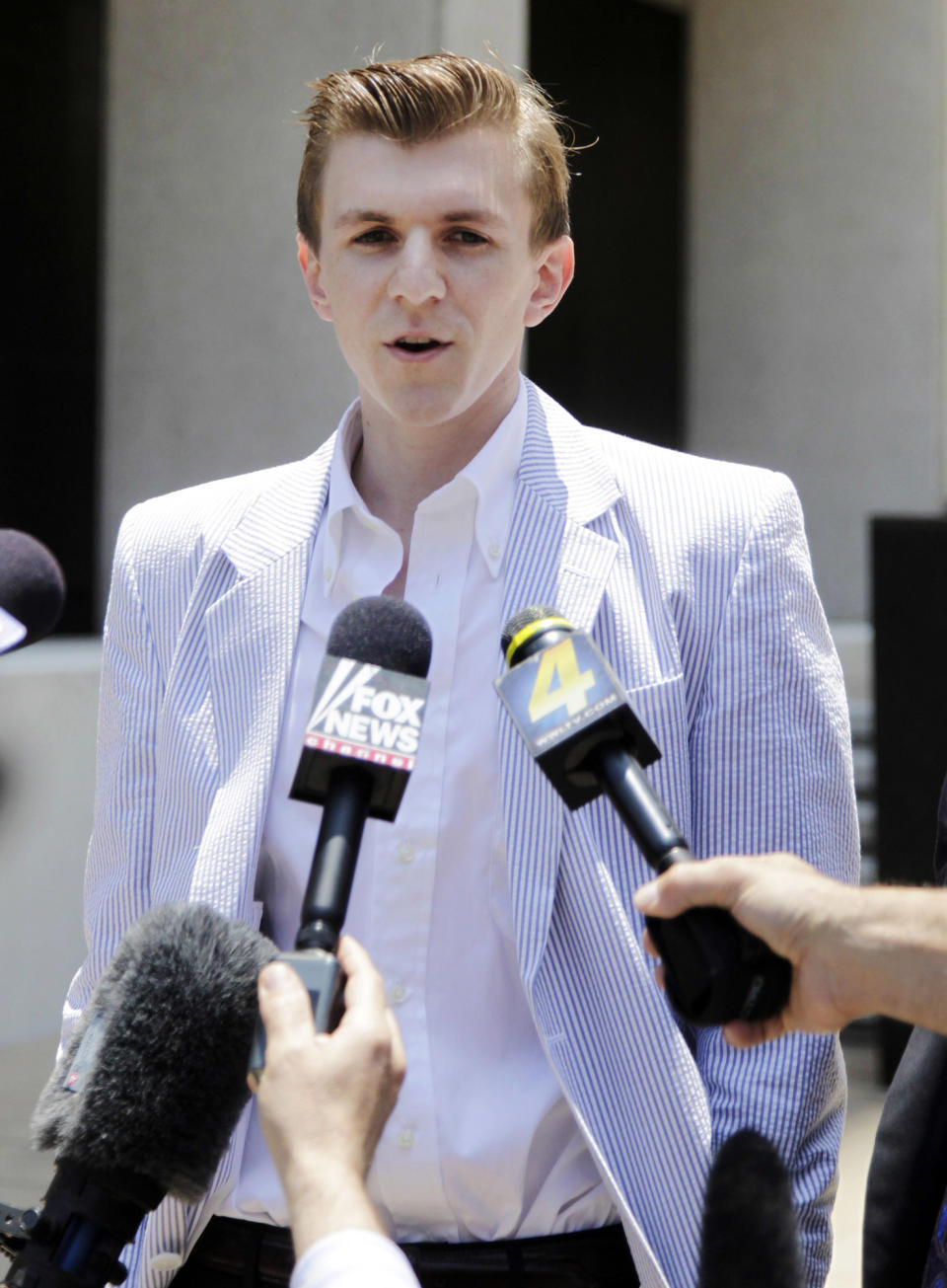 James O'Keefe makes a statement after leaving the federal courthouse in New Orleans, Wednesday, May 26, 2010. O'Keefe who was accused of trying to tamper with the phones in Sen. Mary Landrieu's New Orleans office was sentenced to three years probation, 100 hours of community service and a $1,500 fine, after pleading guilty to misdemeanor charges.  (AP Photo/Bill Haber)