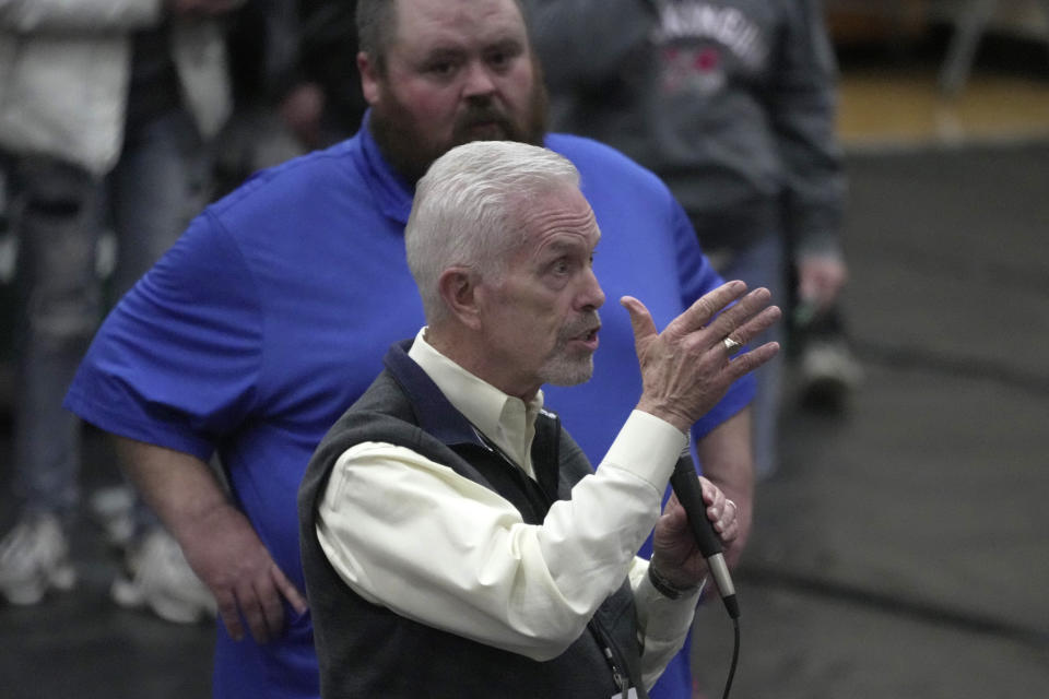 Rep. Bill Johnson answers a question as East Palestine, Ohio Mayor Trent Conaway, rear, listens during a town hall meeting at East Palestine High School in East Palestine, Ohio, Wednesday, Feb. 15, 2023. The meeting was held to answer questions about the ongoing cleanup from the derailment on Feb, 3, of a Norfolk Southern freight train carrying hazardous material. (AP Photo/Gene J. Puskar)