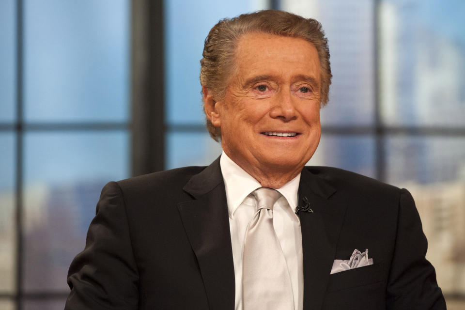 FILE - In this Nov. 18, 2011 file photo, Regis Philbin appears on his farewell episode of "Live! with Regis and Kelly", in New York. Philbin, the genial host who shared his life with television viewers over morning coffee for decades and helped himself and some fans strike it rich with the game show “Who Wants to Be a Millionaire,” has died on Friday, July 24, 2020. (AP Photo/Charles Sykes, File)