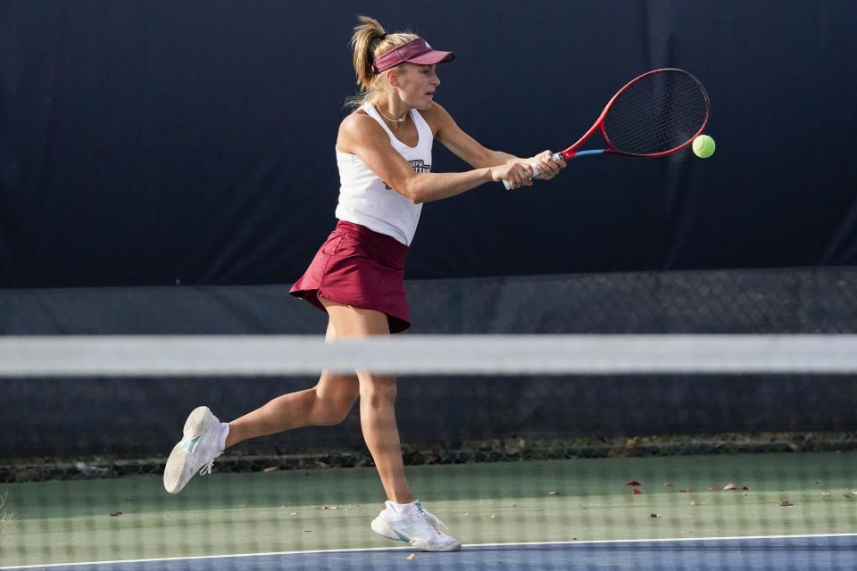 Turpin's Sarah Clark returns the ball during the first round of the OHSAA Division I singles state tennis tournament at the Lindner Family Tennis Center. The junior made it to the quarterfinals.