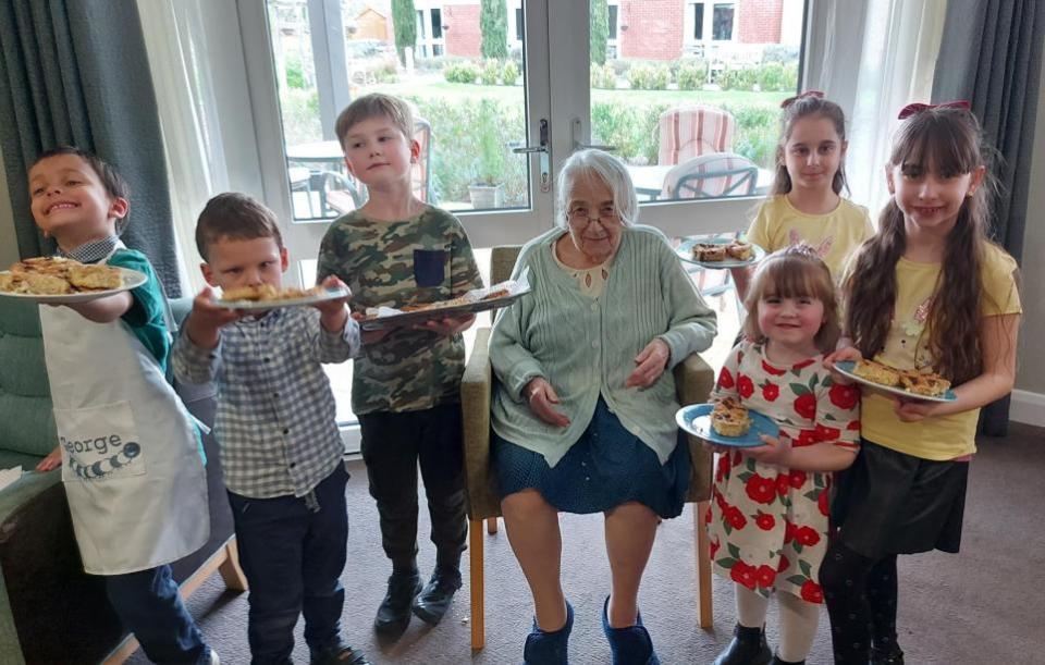 East Anglian Daily Times: A Glastonbury Court resident with her grandchildren 