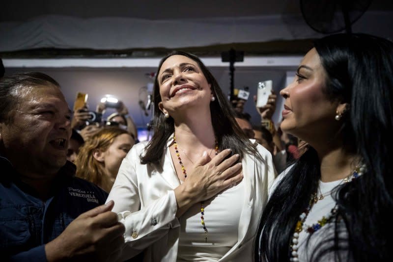 Maria Corina Machado reacts after getting the primary election results in Caracas, Venezuela in October. Machado won the primary elections of opposition candidates for the 2024 presidential elections but was later banned from running. Her party has since scrambled to register a candidate before the deadline. File Photo by Miguel Gutierrez/EPA-EFE