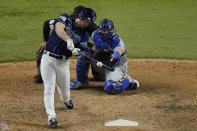 Tampa Bay Rays' Brett Phillips (14) gets the game winning hit against the Los Angeles Dodgers in Game 4 of the baseball World Series Saturday, Oct. 24, 2020, in Arlington, Texas. Rays defeated the Dodgers 8-7 to tie the series 2-2 games. (AP Photo/Sue Ogrocki)