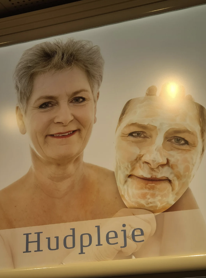 Woman holding a mask of her own face, text below reads "Hudpleje" which means skincare
