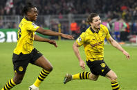 Dortmund's Marcel Sabitzer, right, celebrates his side's 4th goal during the Champions League quarterfinal second leg soccer match between Borussia Dortmund and Atletico Madrid at the Signal-Iduna Park in Dortmund, Germany, Tuesday, April 16, 2024(AP Photo/Martin Meissner)