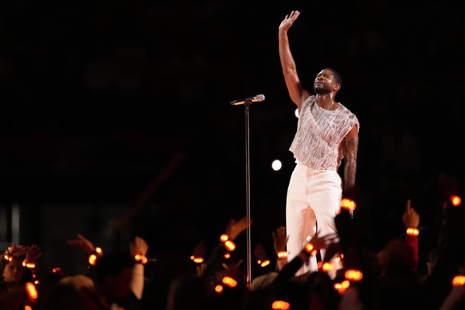 Usher performs during halftime of the NFL Super Bowl 58 football game between the San Francisco 49ers and the Kansas City Chiefs on Sunday, Feb. 11, 2024, in Las Vegas. (AP Photo/Eric Gay)