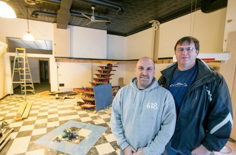 Scott Schmelzel and Mike Thouvenot are inside the future Crafty Sugar Co. at 104 E. Main St. in Belleville in this BND file photo from 2018.