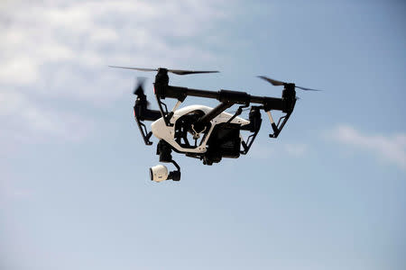 A DJI Inspire drone hovers during a drone training session for Somali police in Mogadishu, Somalia May 25, 2017. Picture taken May 25, 2017. REUTERS/Feisal Omar