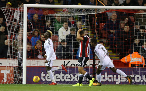 Sheyi Ojo, left, on loan from Liverpool scored the first of the game's nine goals - Credit: Nigel French/PA