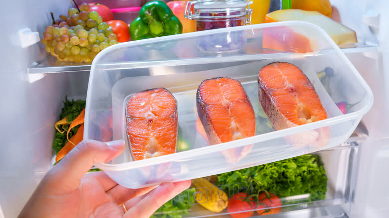 salmon in plastic containers