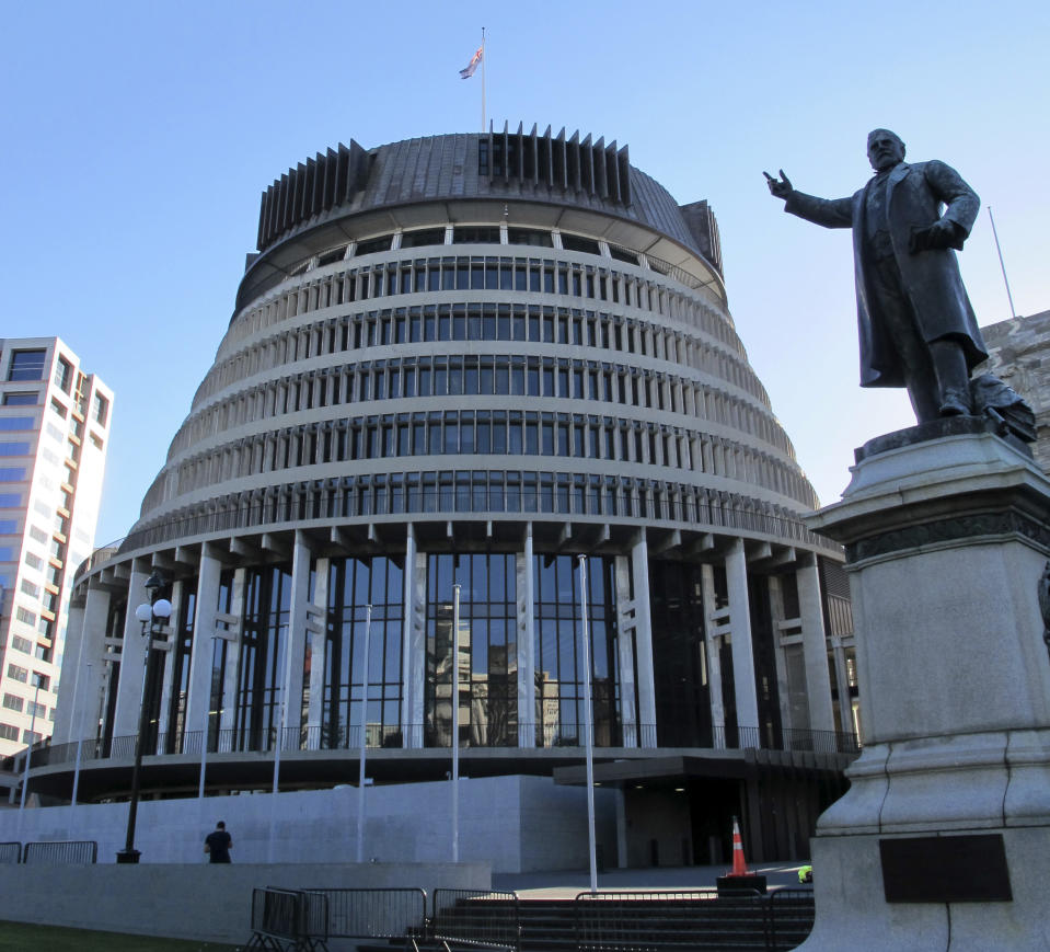 In this Oct. 22, 2012 photo, the unusual design of the New Zealand Parliament's executive wing, known as the Beehive, graces the skyline in Wellington, New Zealand. Whether you're a fan making a pilgrimage to the city where the “The Lord of the Rings” films were made, or you have no interest whatsoever in dwarfs and goblins, there's plenty to do in Wellington. For free. (AP Photo/Nick Perry)