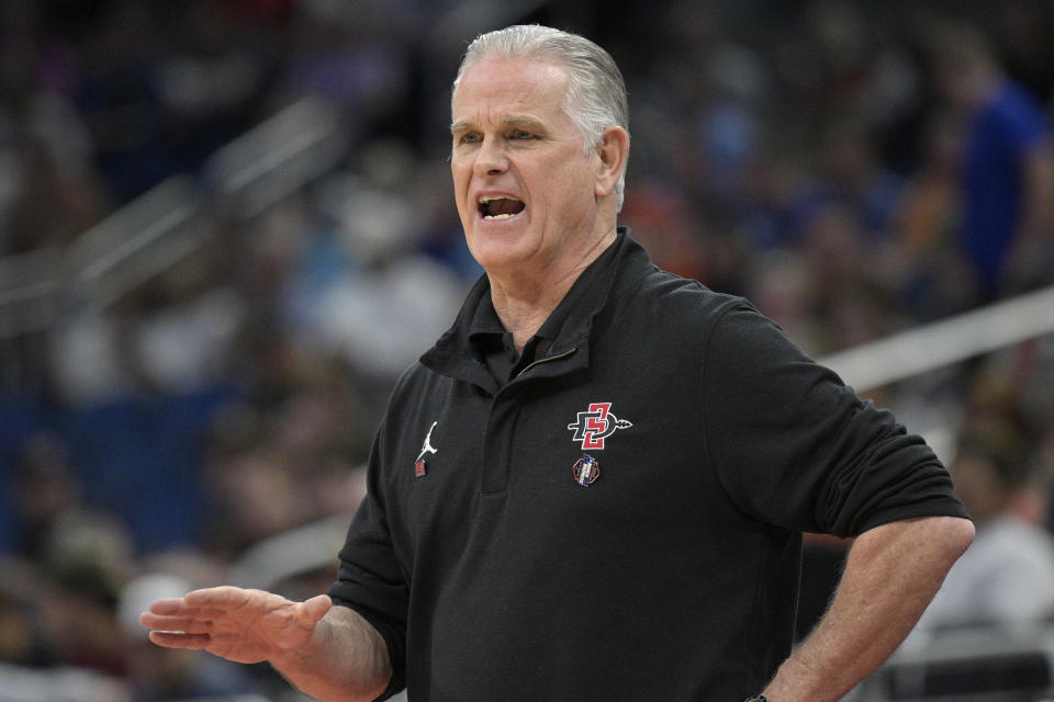 San Diego State head coach Brian Dutcher calls out instructions during the first half of a first-round college basketball game against Charleston in the NCAA Tournament, Thursday, March 16, 2023, in Orlando, Fla. (AP Photo/Phelan M. Ebenhack)