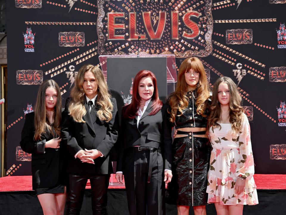 Harper Vivienne Ann Lockwood, Lisa Marie Presley, Priscilla Presley, Riley Keough, and Finley Aaron Love Lockwood attend the Handprint Ceremony honoring Three Generations of Presley's at TCL Chinese Theatre on June 21, 2022.