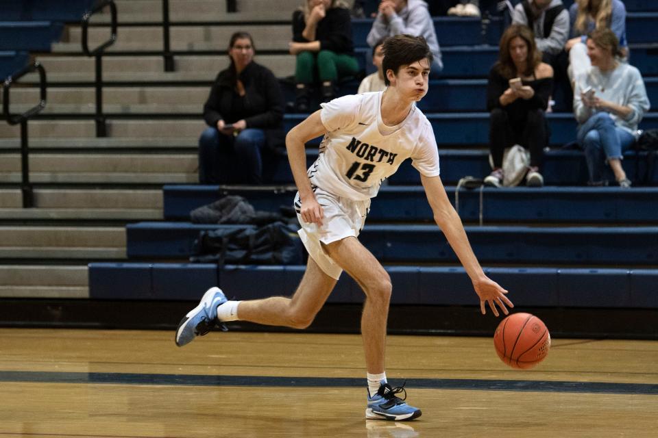 CR North senior Cole McCarthy runs the ball down the court at Council Rock North High School on Tuesday, Dec. 6, 2022. CR North defeated Lower Moreland 55-49 in the season opener.