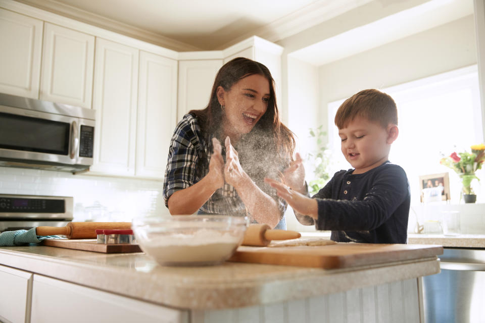 Felicia, mom of two boys, has fun in the kitchen with her older son. (Photo: WW)