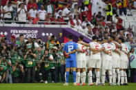 Morocco players pose for photographers prior to the World Cup group F soccer match between Belgium and Morocco, at the Al Thumama Stadium in Doha, Qatar, Sunday, Nov. 27, 2022. (AP Photo/Frank Augstein)