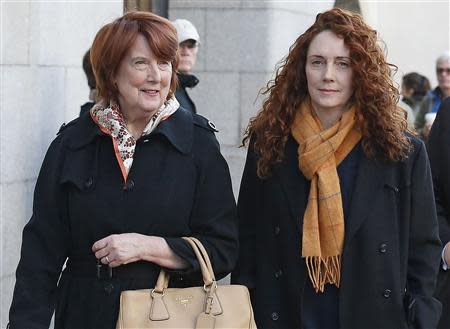 Former News International chief executive Rebekah Brooks (R) arrives with her mother Deborah Wade at the Old Bailey courthouse in London November 14, 2013. REUTERS/Olivia Harris