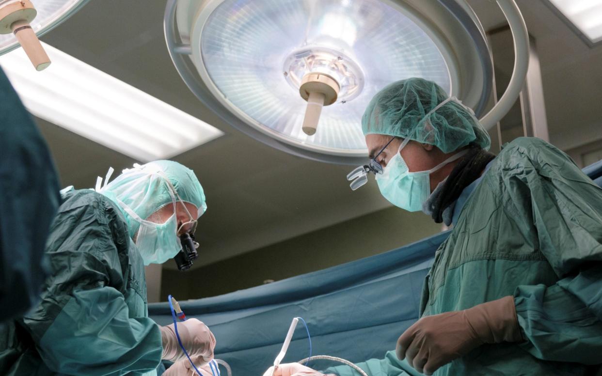 Doctors performing surgery - Ospedale Pediatrico Bambino Gesu/Reuters