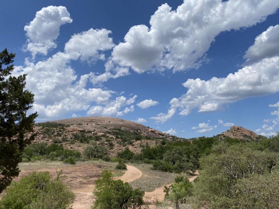<p>Everybody’s favorite day trip from Austin, <a href="https://tpwd.texas.gov/state-parks/enchanted-rock/trails-info" rel="nofollow noopener" target="_blank" data-ylk="slk:Enchanted Rock;elm:context_link;itc:0;sec:content-canvas" class="link ">Enchanted Rock</a>—a natural area named because its main rock purportedly sings to you as you climb—appeals to hikers of all ages. Scientists say the singing sounds come from deep within the rock, and are spurred by temperature changes, but…a woman can still wonder. The park has 11 miles of trails, though most of them are shorter than one mile. Just be sure to pace yourself on the popular Summit Trail, which leads to the top in about 45 minutes (an elevation equal to climbing forty stories). </p><p><strong>Miles: </strong>11 miles of trails, most of them shorter than a mile</p><p><strong>Level: </strong>Moderate </p><p><strong>More deets:</strong> $8 entrance fee for adults; children under 12 are free. Make reservations for parking or camping: 512-389-8900. All trails close after sunset, except the Loop Trail.</p>