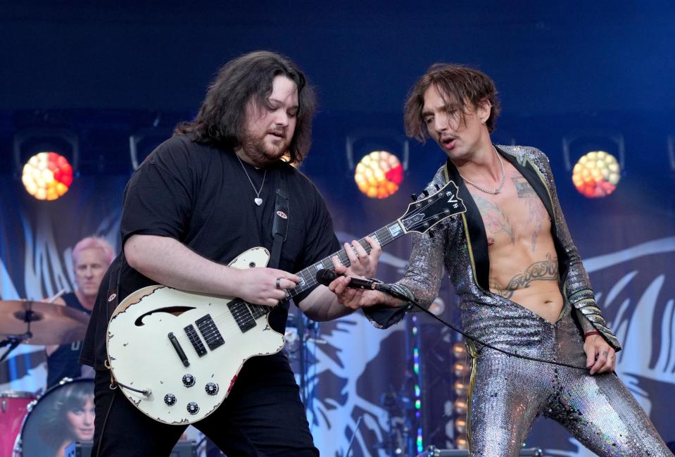 Wolfgang Van Halen, left, and Justin Hawkins of The Darkness play Van Halen classics at the Taylor Hawkins tribute concert in 2022.