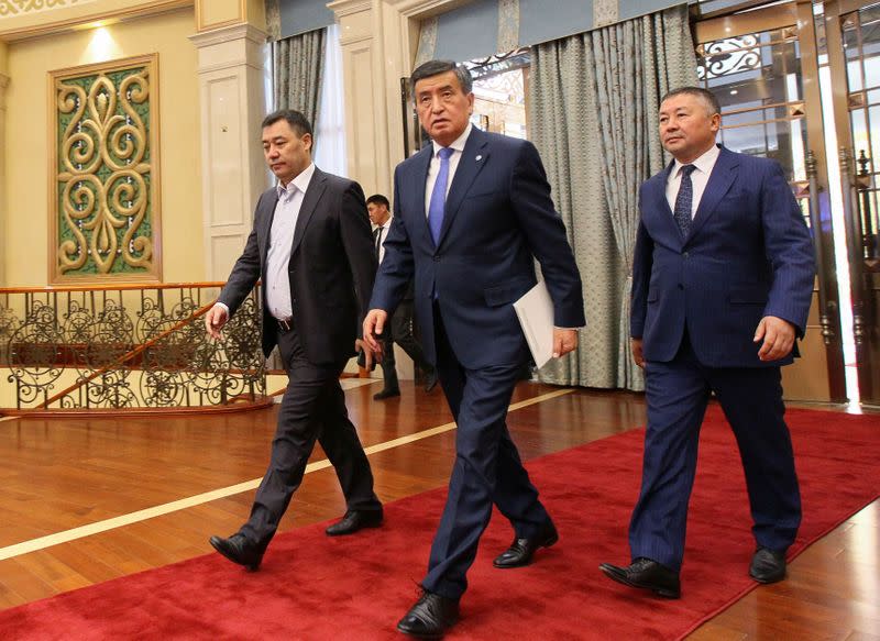 Kyrgyzstan's former President Jeenbekov, Prime Minister Japarov and Parliament's Speaker Isayev attend a session of parliament in Bishkek