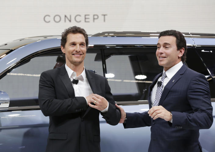 Actor Matthew McConaughey, left, and Ford CEO Mark Fields introduce the Lincoln Navigator Concept at the New York International Auto Show, Wednesday, March 23, 2016. (AP Photo/Mark Lennihan)