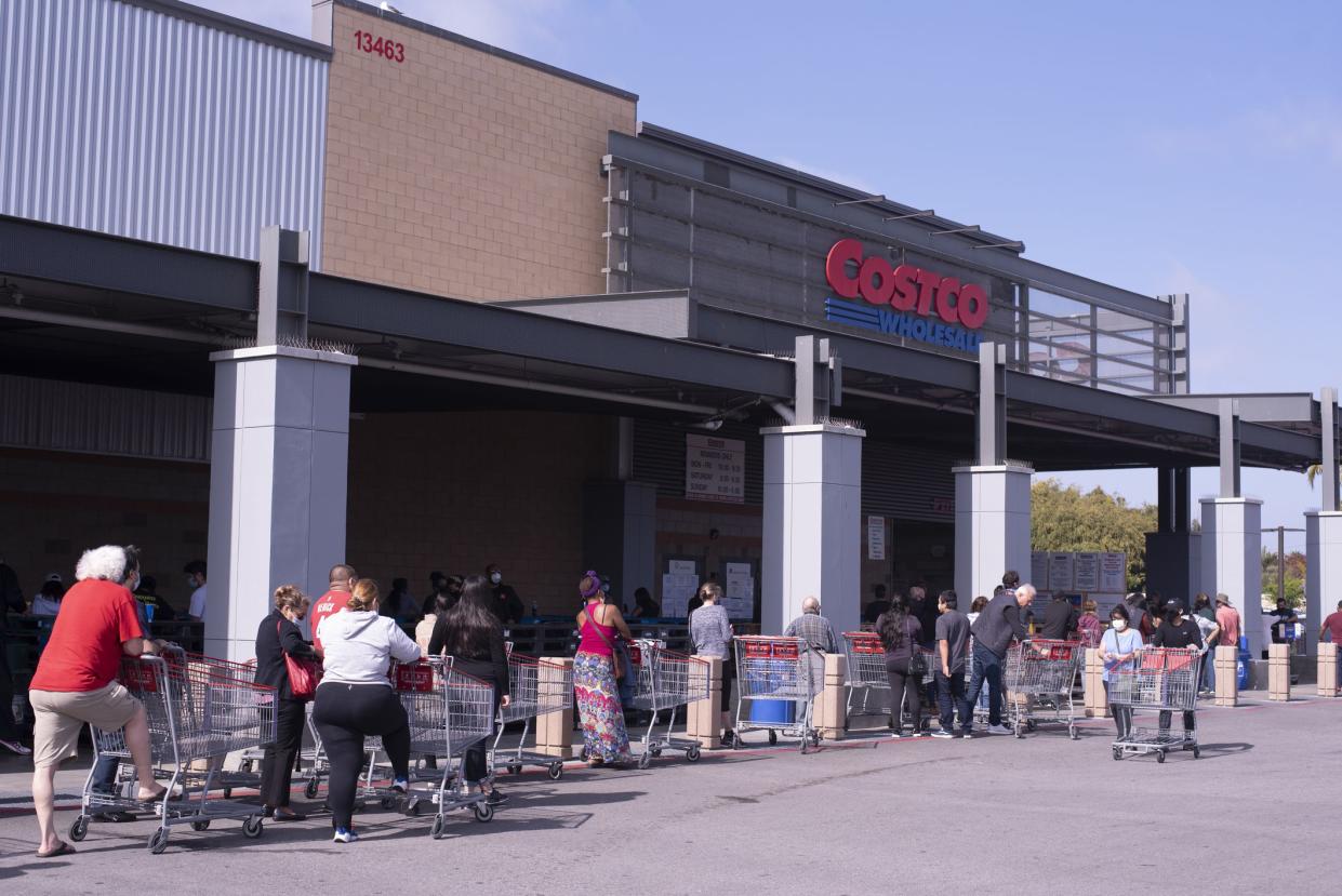 April 16, 2020 /  Los Angeles, CA: People lined up at Costco wearing masks keeping six feet apart.
