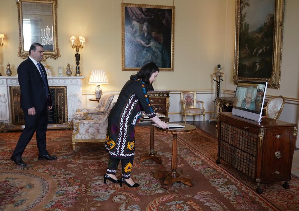 Rukhshona Emomali, Ambassador of the Republic of Tajikistan, presents her credentials to the Queen (Yui Mok/PA) (PA Wire)