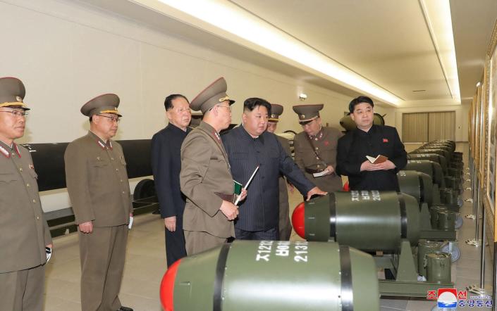 North Korea on Tuesday unveiled new, smaller nuclear warheads - STR