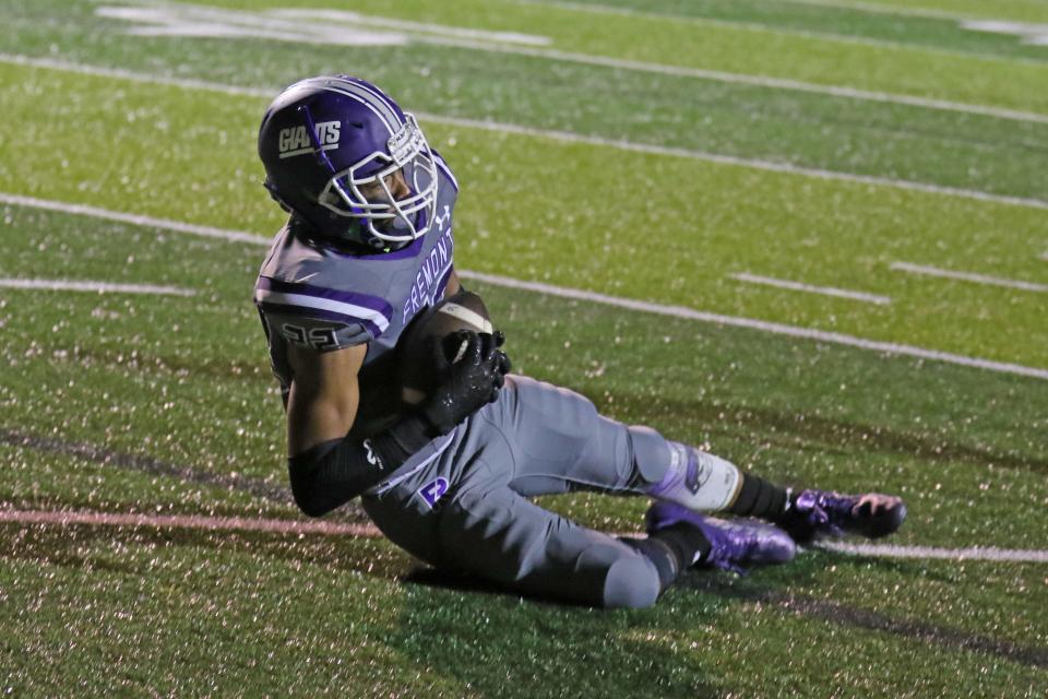 Ross' Anthony Vann makes a sliding catch for a touchdown.