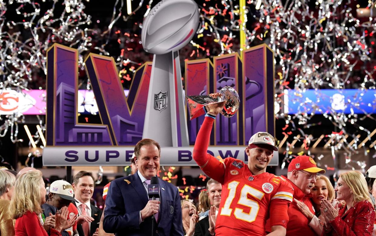 Chiefs quarterback Patrick Mahomes lifts the Vince Lombardi trophy