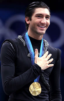 Evan Lysacek of the United States celebrates after winning the gold medal