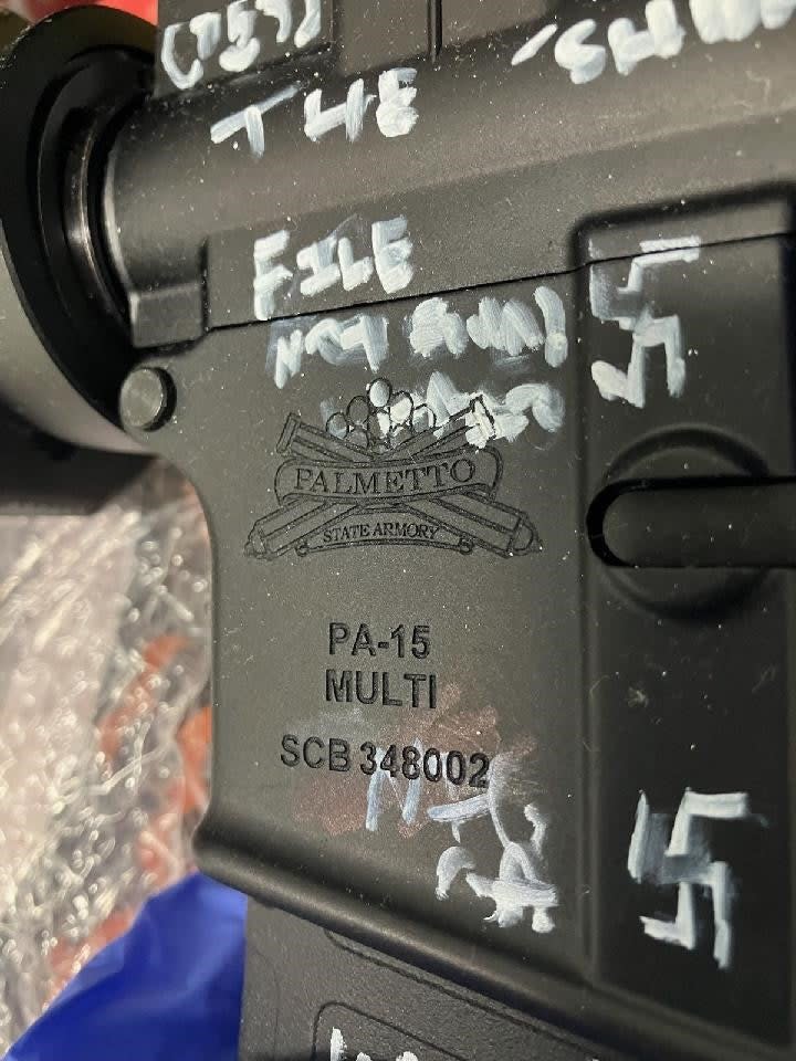 Gun used in Florida Dollar General shooting, showing swastikas (Jacksonville Sheriff’s Office)