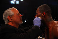 ATLANTIC CITY, NJ - APRIL 28: Chad Dawson has a cut above his left eye tended to after he was cut by an accidental head butt by Bernard Hopkins during their WBC & Ring Magazine Light Heavyweight Title fight at Boardwalk Hall Arena on April 28, 2012 in Atlantic City, New Jersey. (Photo by Al Bello/Getty Images)