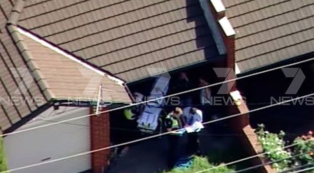 A Glenroy woman has been wheeled out by paramedics with critical stab wounds. Picture: 7 News