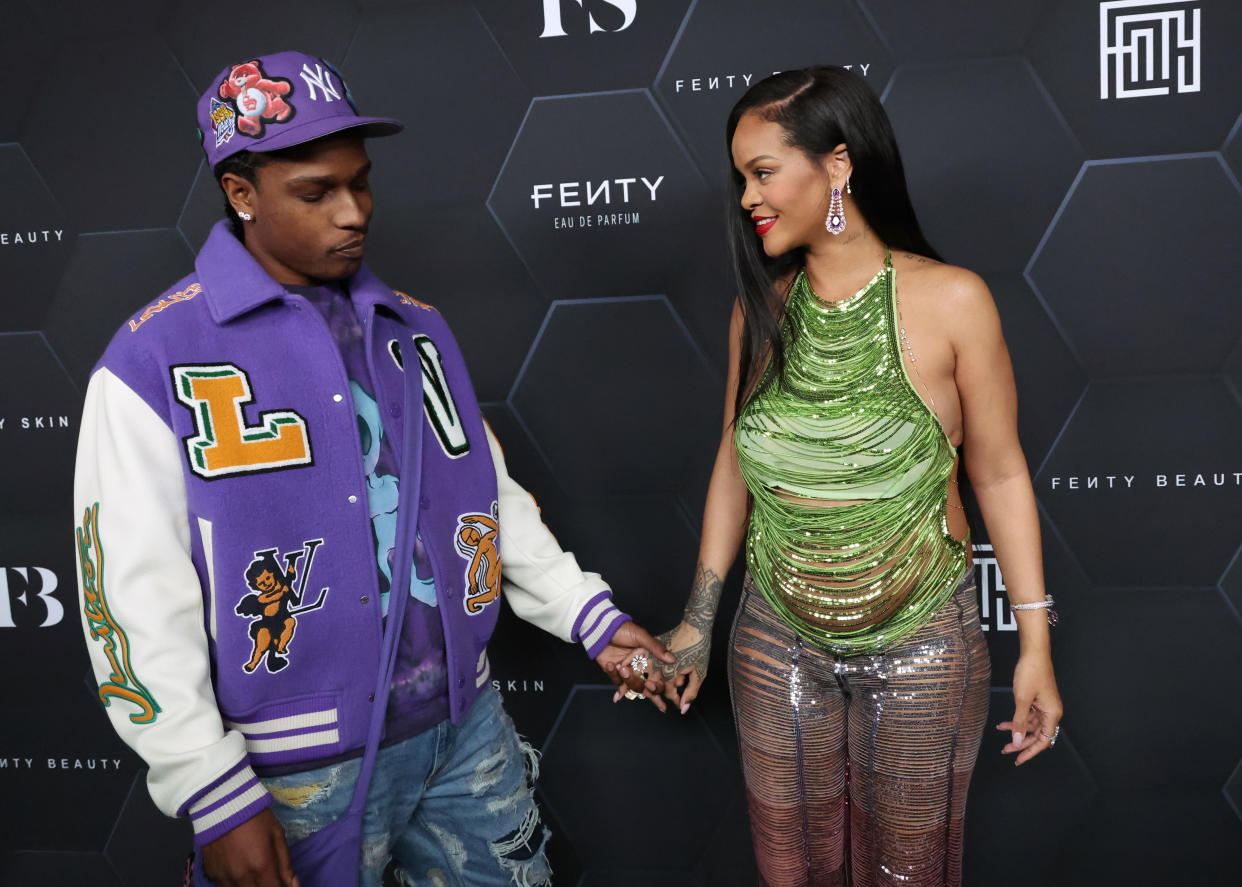 LOS ANGELES, CALIFORNIA - FEBRUARY 11: ASAP Rocky and  Rihanna pose for a picture as they celebrate her beauty brands Fenty Beauty and Fenty Skinat Goya Studios on February 11, 2022 in Los Angeles, California. (Photo by Mike Coppola/Getty Images)