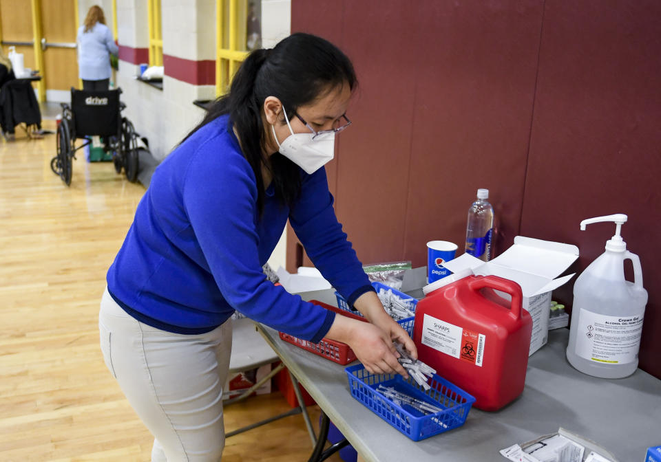 Reading, PA - April 12: Pharmacist Dr. Uyen Ngo with some syringes ready to administer doeses of COVID-19 vaccine. At Alvernia University in Reading, PA Monday morning April 12, 2021 where the school, working with Rite Aid Pharmacy, held a COVID-19 vaccination clinic administering doses of the Pfizer-BioNTech vaccine for staff and students in the Physical Education Center. (Photo by Ben Hasty/MediaNews Group/Reading Eagle via Getty Images)