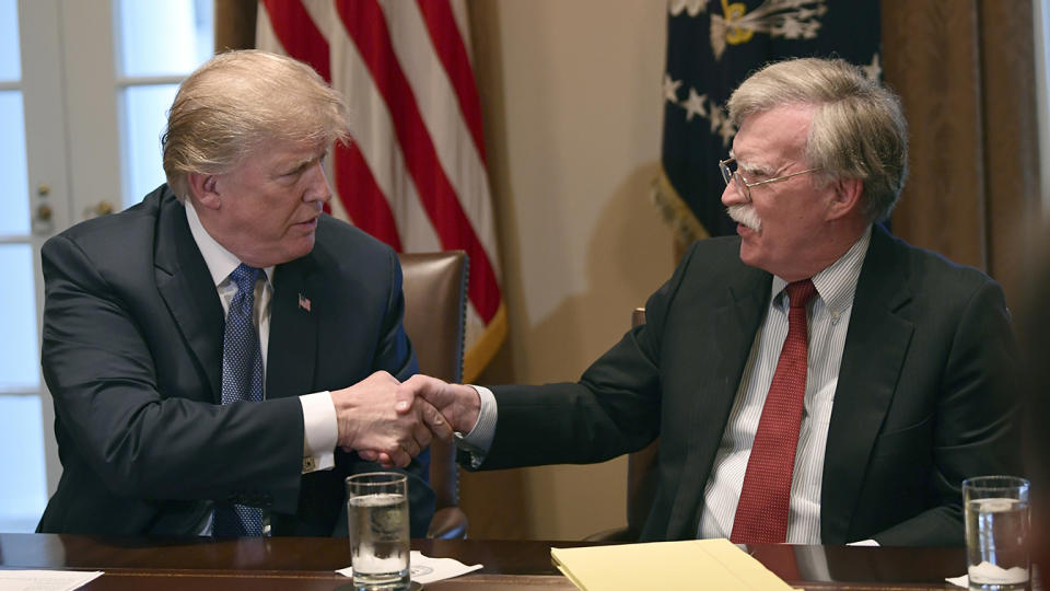  In this April 9, 2018 file photo, President Donald Trump shakes hands with national security adviser John Bolton. (AP Photo/Susan Walsh)
