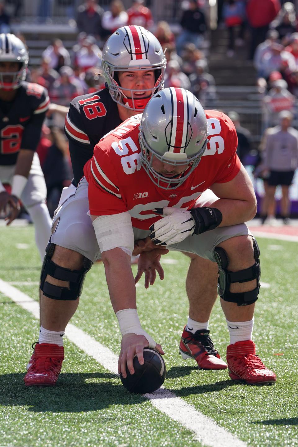 Apr 13, 2024; Columbus, OH, USA; Ohio State Buckeyes quarterback Will Howard (18) lines up under Ohio State Buckeyes center Seth McLaughlin (56) during warmups before the Ohio State football spring game at Ohio Stadium.