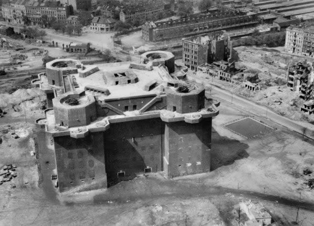 A heavily fortified <em>Flakturm</em>, or anti-aircraft artillery tower, in Hamburg, Germany, in April 1945. It is armed with four twin 12.8-cm <a href="https://en.wikipedia.org/wiki/12.8_cm_FlaK_40" rel="nofollow noopener" target="_blank" data-ylk="slk:Flak Zwilling 40;elm:context_link;itc:0;sec:content-canvas" class="link ">Flak Zwilling 40</a> guns.<em> Australian War Memorial</em>