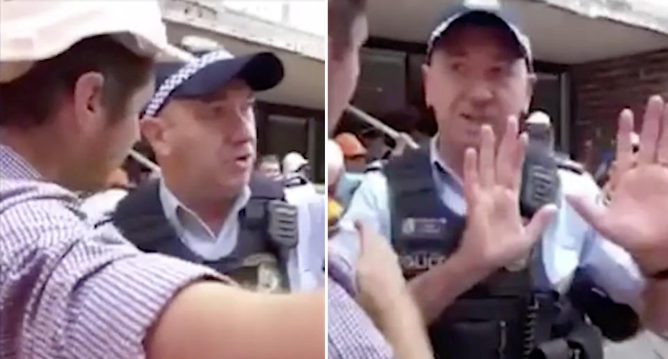 Police officers clashed with workers, telling them to step back from the collapsed scaffolding. Source: 7 News