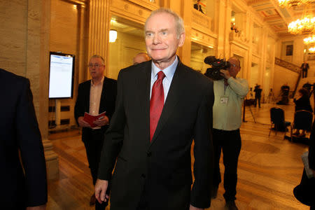 FILE PHOTO: Northern Ireland's former Deputy First Minister Martin McGuinness leaves Assembly at Parliament Buildings in Stormont in Belfast, Northern Ireland, January 16, 2017. REUTERS/Clodagh Kilcoyne/File Photo